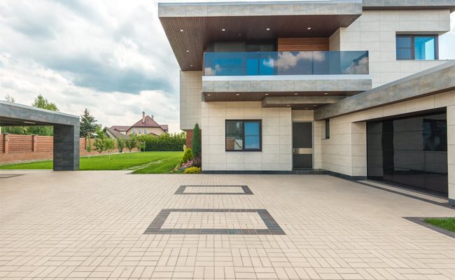 Making the Right Choice: Paving vs. Traditional Concrete Driveways